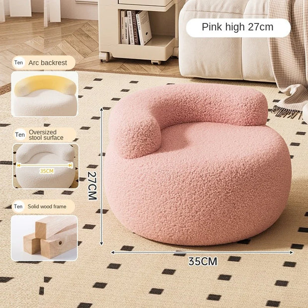 pink round ottoman